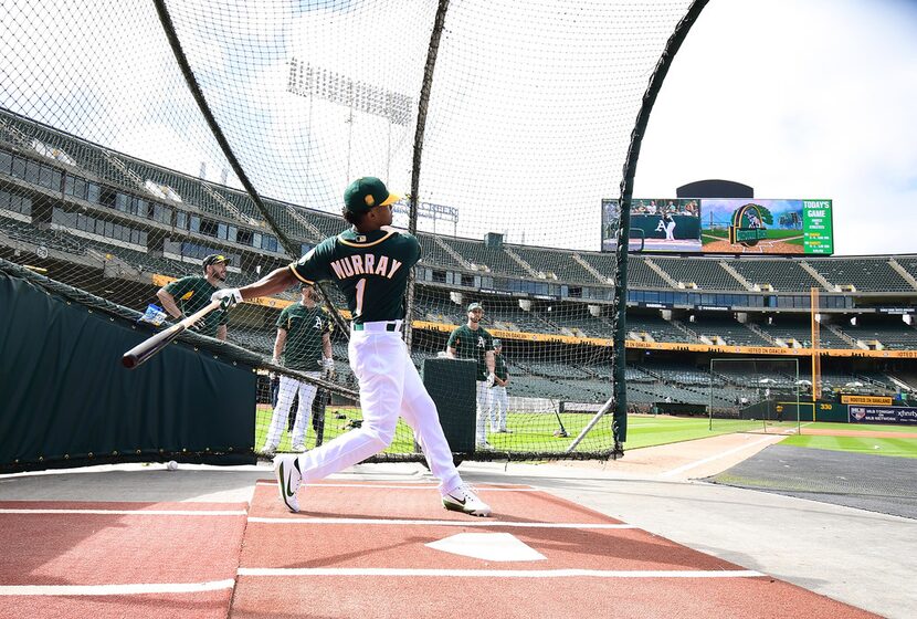 OAKLAND, CA - JUNE 15:  The Oakland Athletics number one draft pick Kyler Murray #1 an...