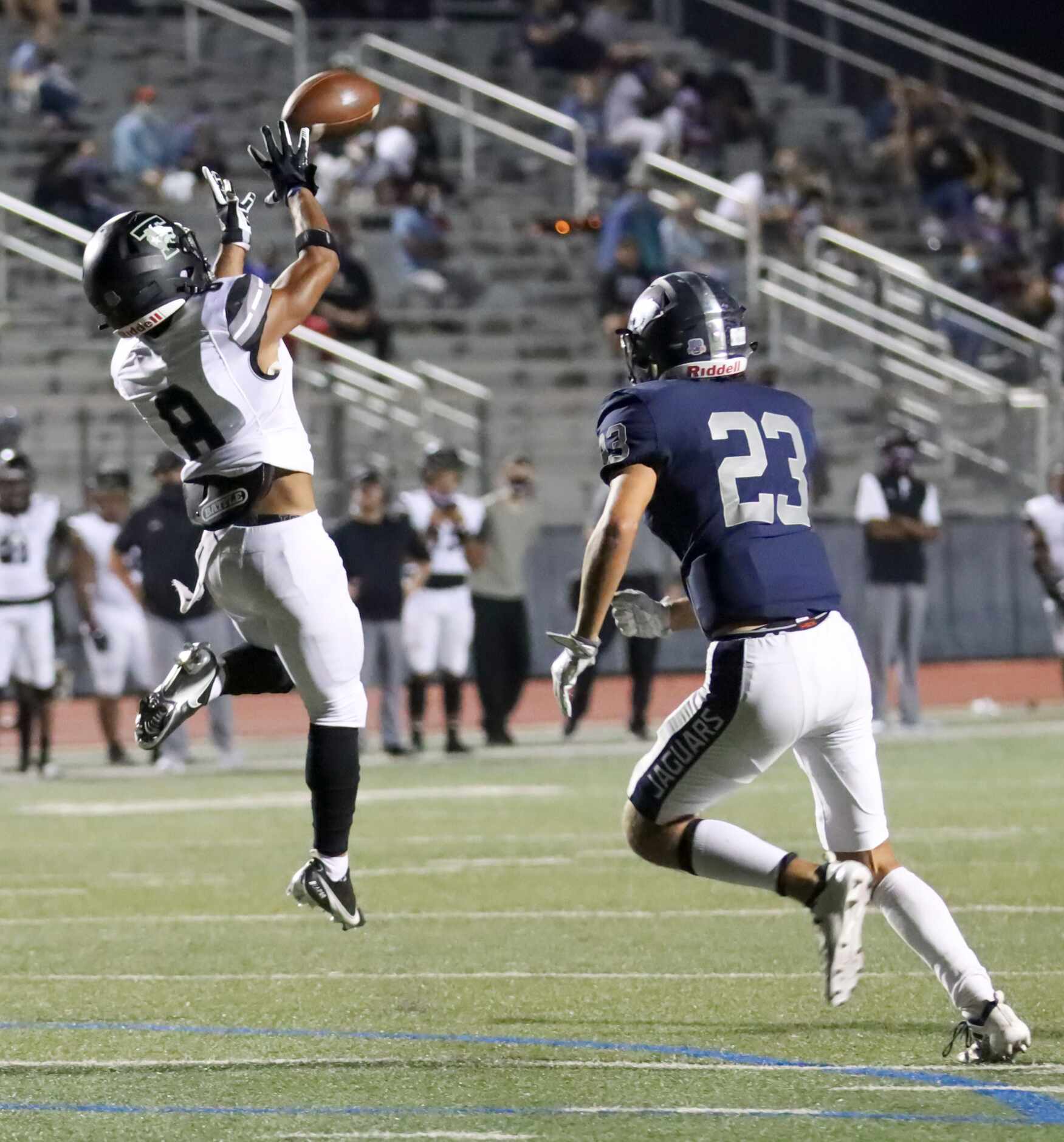 Mansfield Timberview wide receiver Andre Williams (8) catches the ball over Flower Mound...