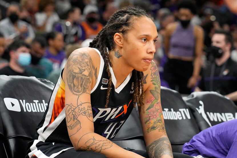 FILE - Phoenix Mercury center Brittney Griner sits during the first half of Game 2 of...