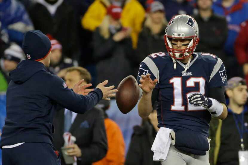 FILE - In this Jan. 18, 2015, file photo, New England Patriots quarterback Tom Brady has a...