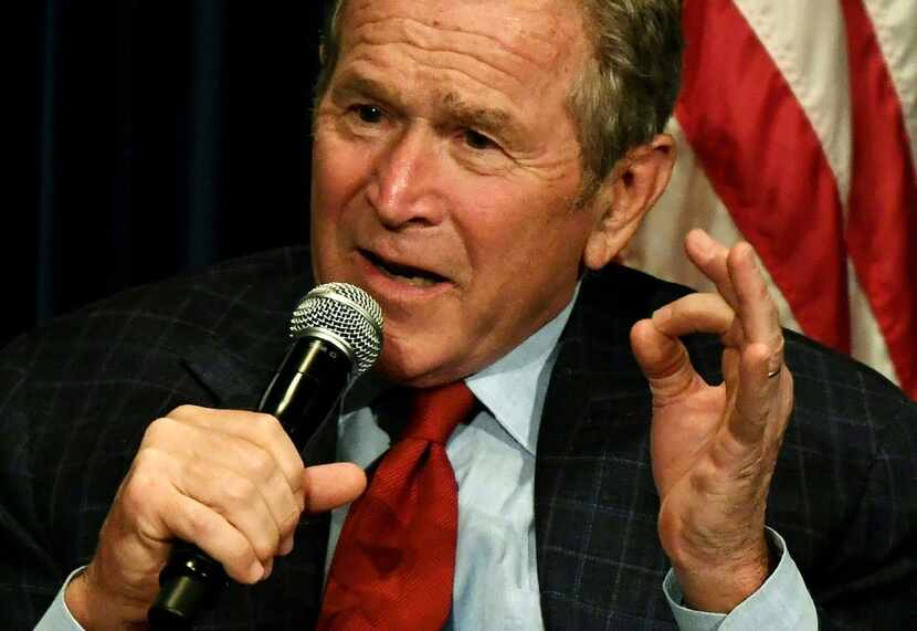 Former US President George W. Bush speaks at the Ronald Reagan Presidential Library as he...