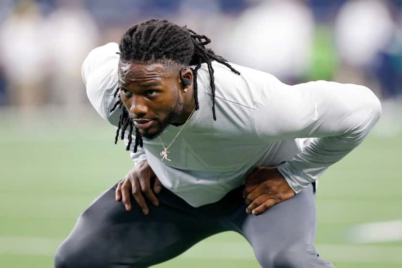 Dallas Cowboys middle linebacker Jaylon Smith (54) stretches during pregame warmups at AT&T...