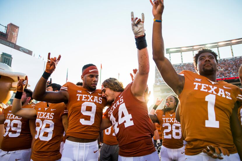 Texas Longhorns celebrate a 23-17 win over the Baylor Bears on Saturday, October 13, 2018 at...