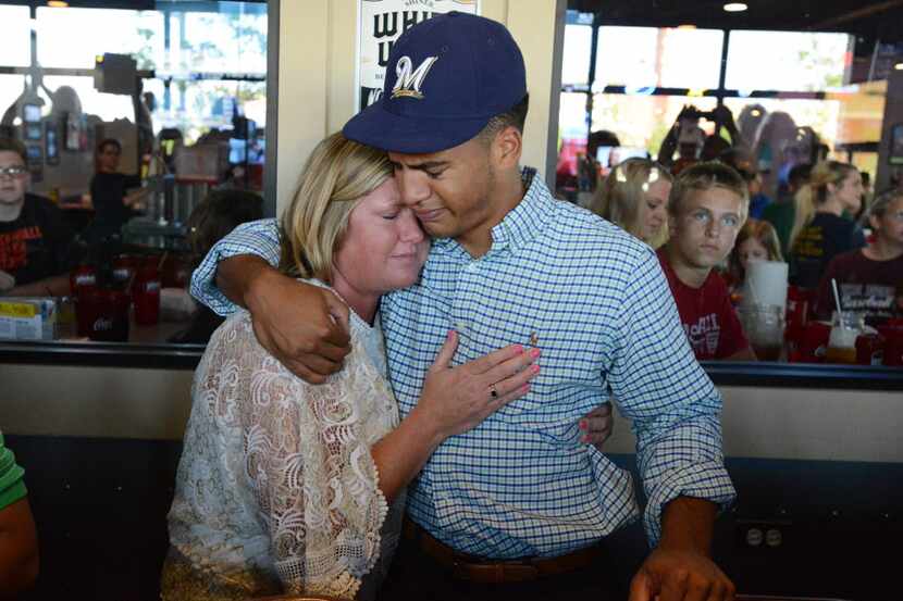 Michelle Grisham and son Trent Clark share an emotional moment when Trent was chosen by the...