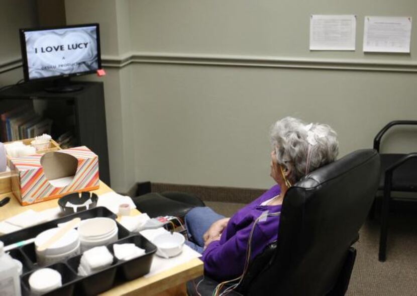 
A patient sits in a treatment session at the Neurotherapy Center of Dallas. In 2012,...