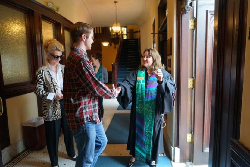 
Senior Pastor Anna Hosemann-Butler chats with congregants after the service Sept. 14.
