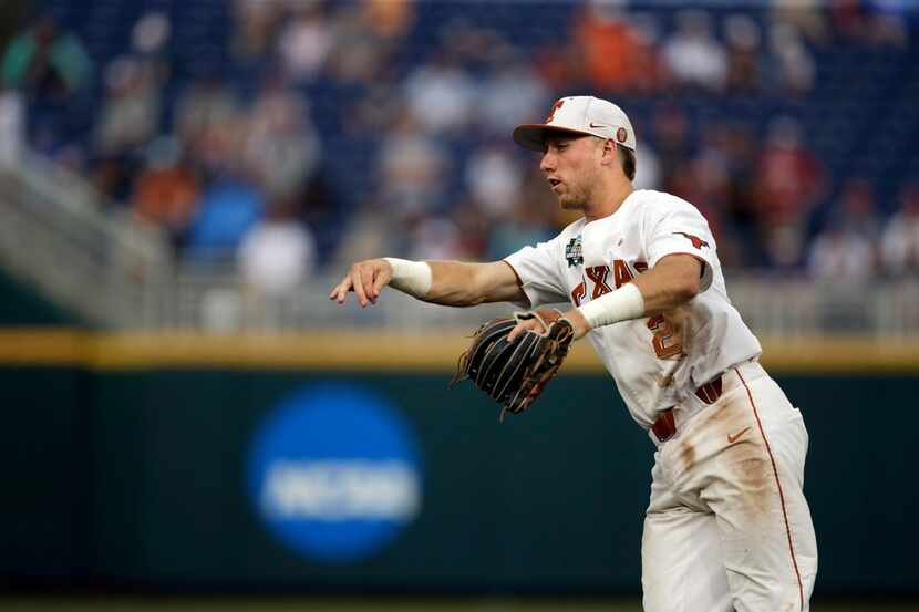 Texas second baseman Kody Clemens throws out Florida's Deacon Liput in the eighth inning of...