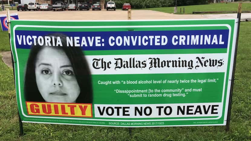 Courtesy photo of the yard signs targeting Rep. Victoria Neave, which say they were paid for...