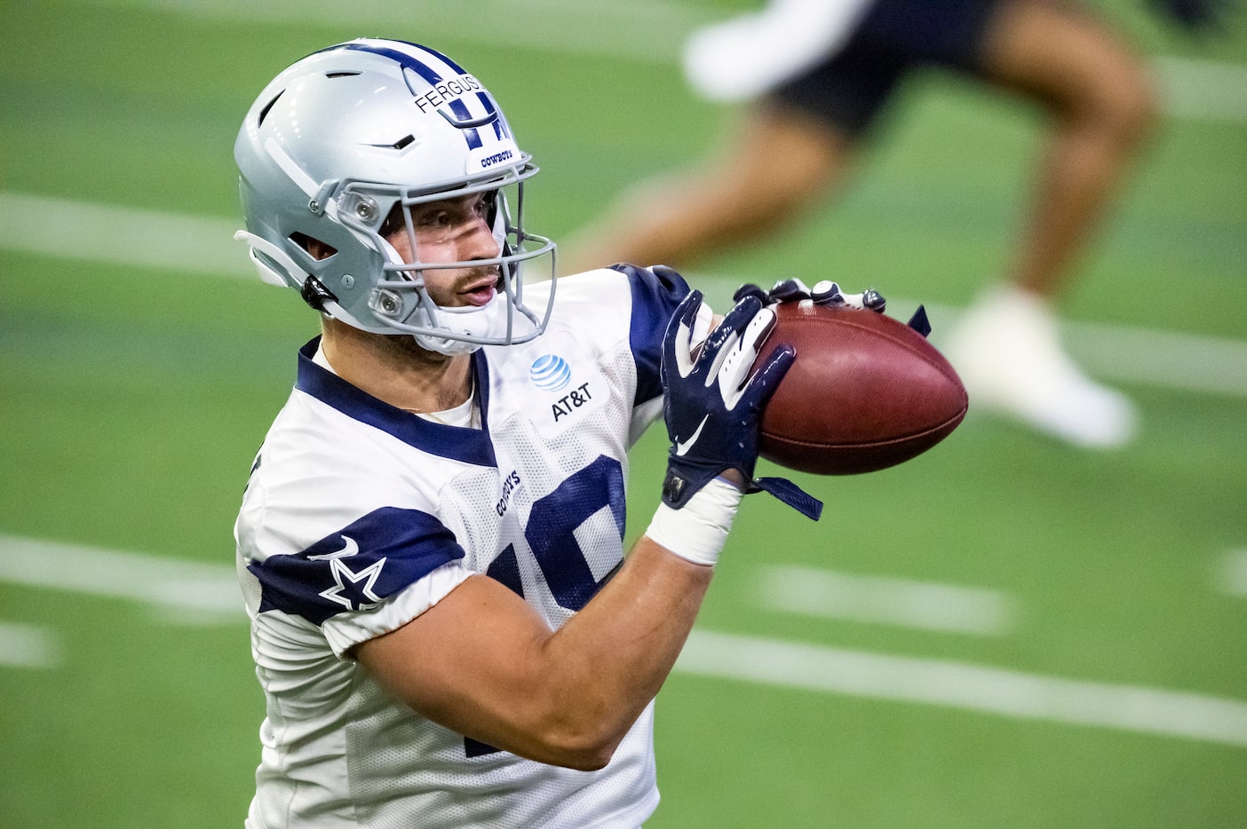 Dallas Cowboys tight end Jake Ferguson catches a pass during practice at The Star in Frisco,...