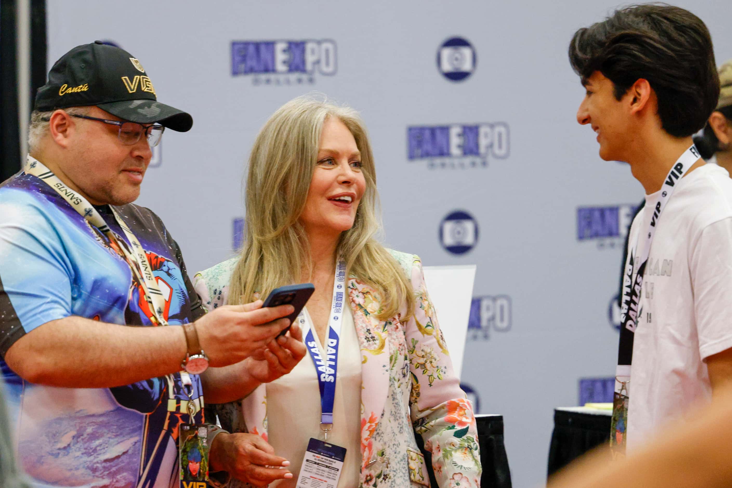Rene Cantu (left) and Joel Gonzalez (right) talk with actress Beverly D'Angelo at Fan Expo...