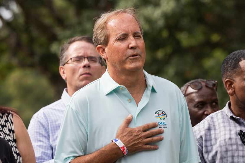 Texas Attorney General Ken Paxton says the pledge of allegiance at a Labor Day picnic hosted...