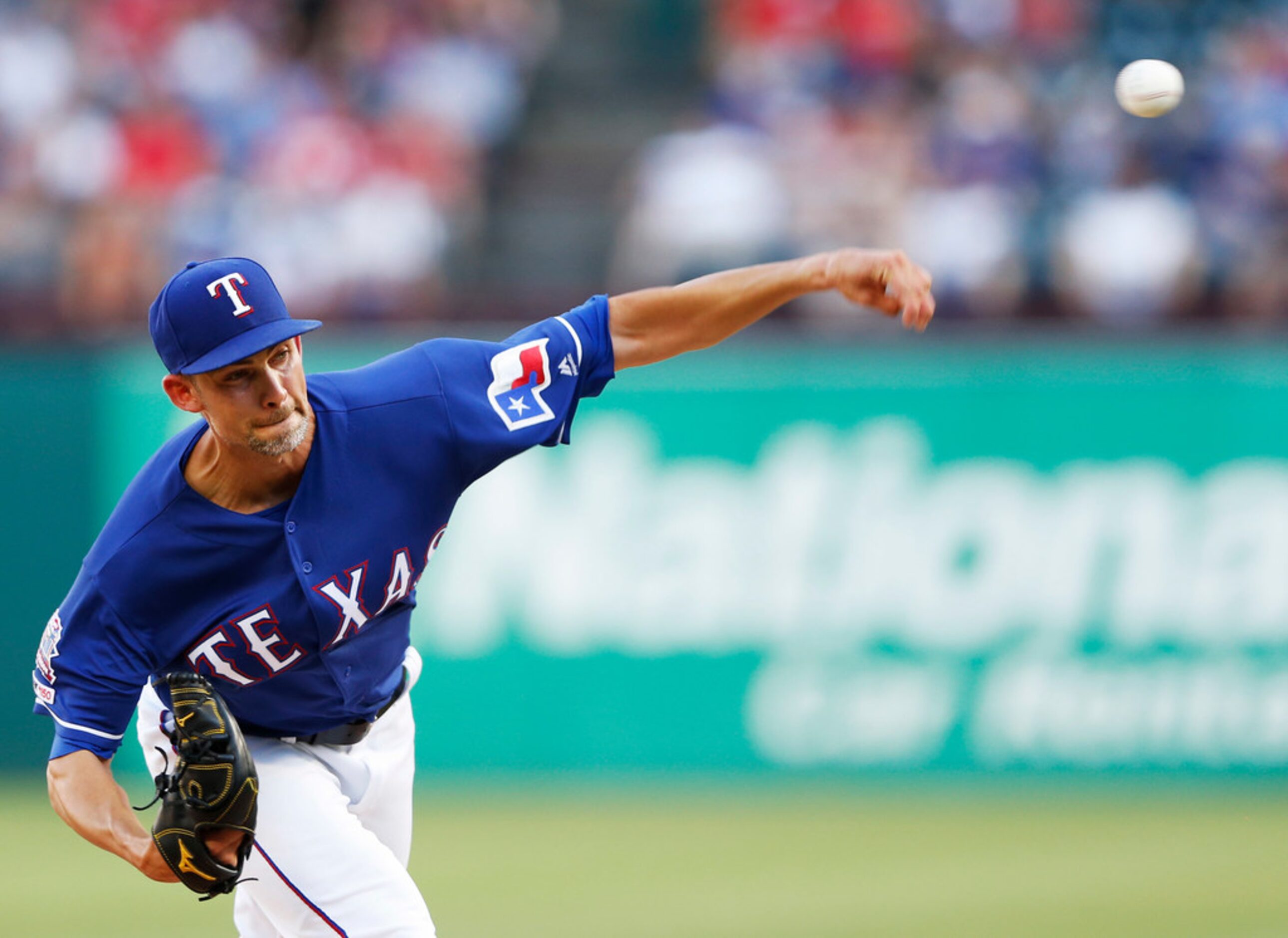 Texas Rangers starting pitcher Mike Minor (23) pitches during the first inning of play at...