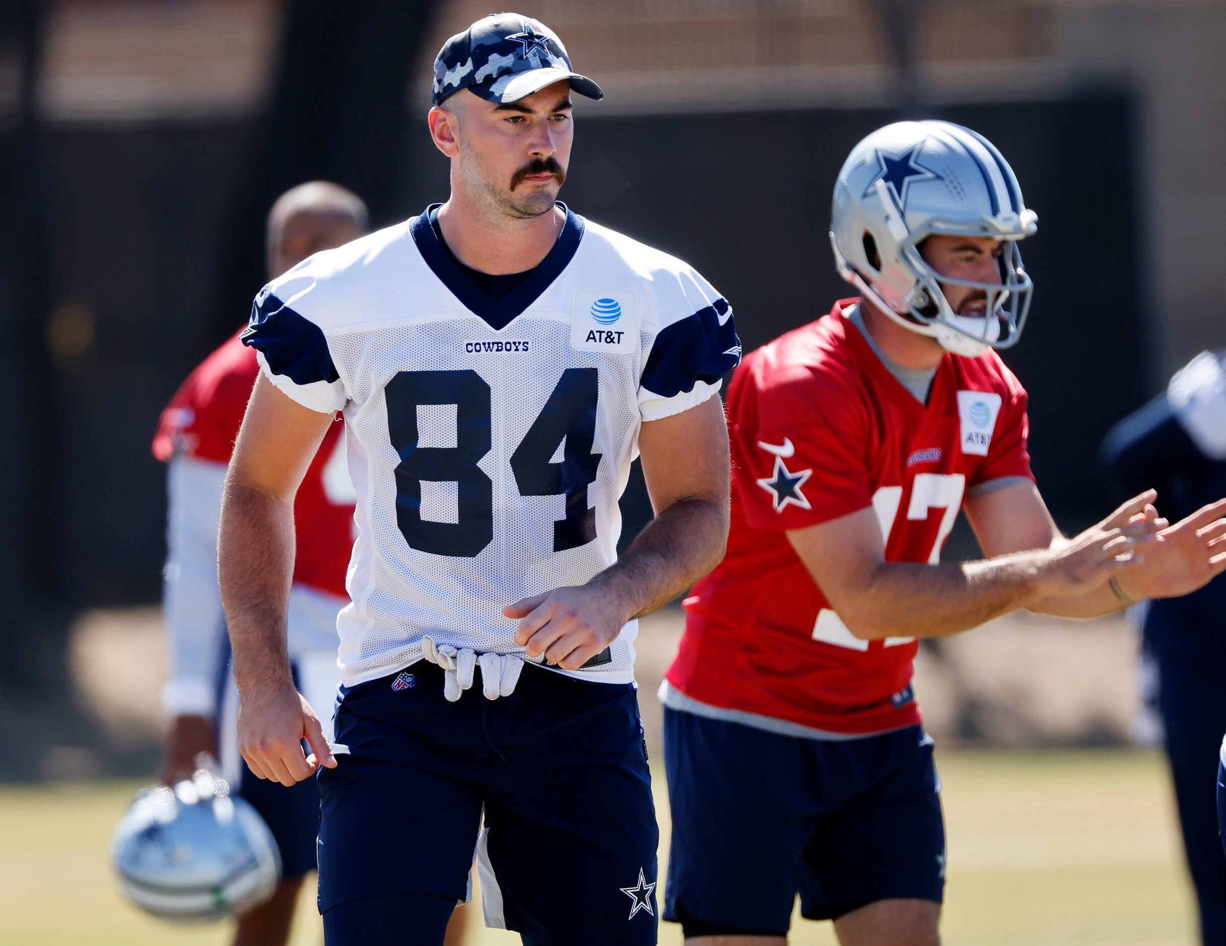 Dallas Cowboys tight end Sean McKeon (84) slides to the outside as they run a walk-thru play...