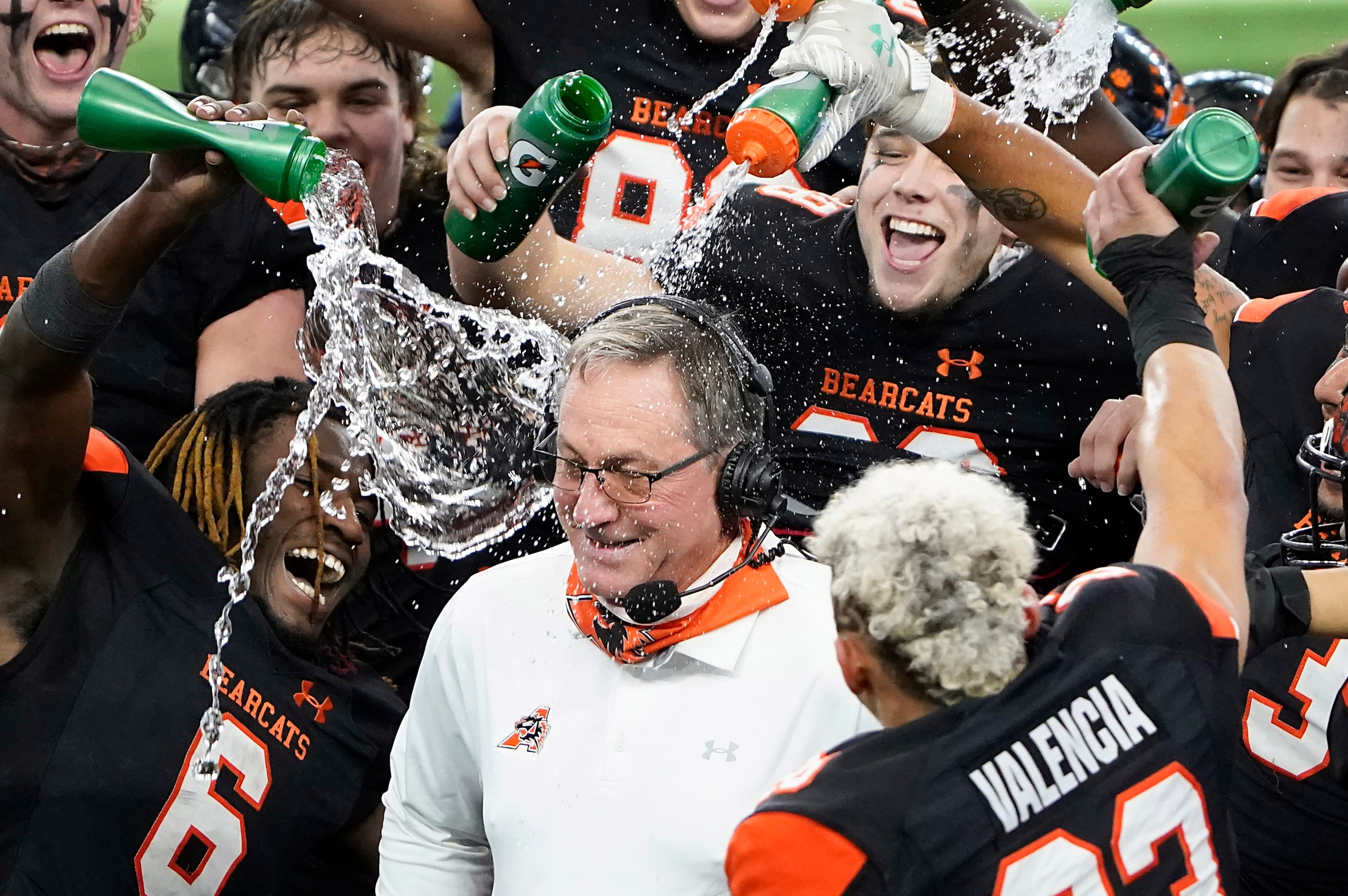 Aledo running back DeMarco Roberts (6), the offensive MVP of the game, leads the charge as...