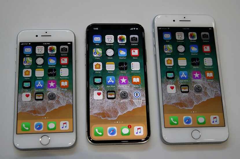 From left: The new iPhone 8, iPhone X and iPhone 8S are displayed during an Apple special...