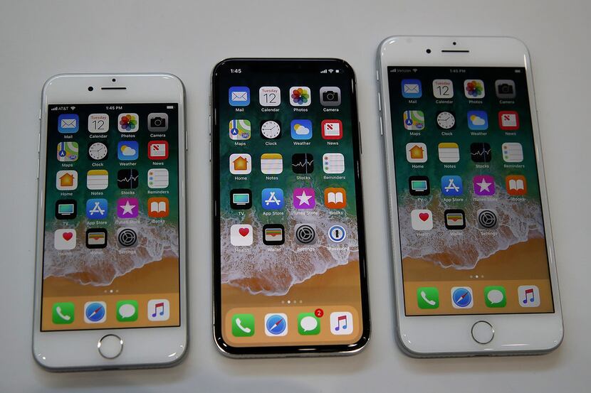 From left: The new iPhone 8, iPhone X and iPhone 8S are displayed during an Apple special...