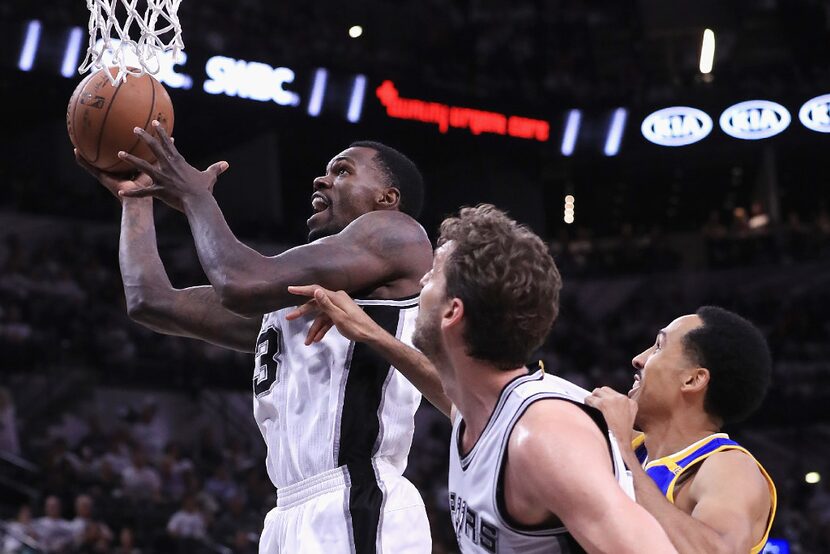 SAN ANTONIO, TX - MAY 20:  Dewayne Dedmon #3 of the San Antonio Spurs drives to the basket...