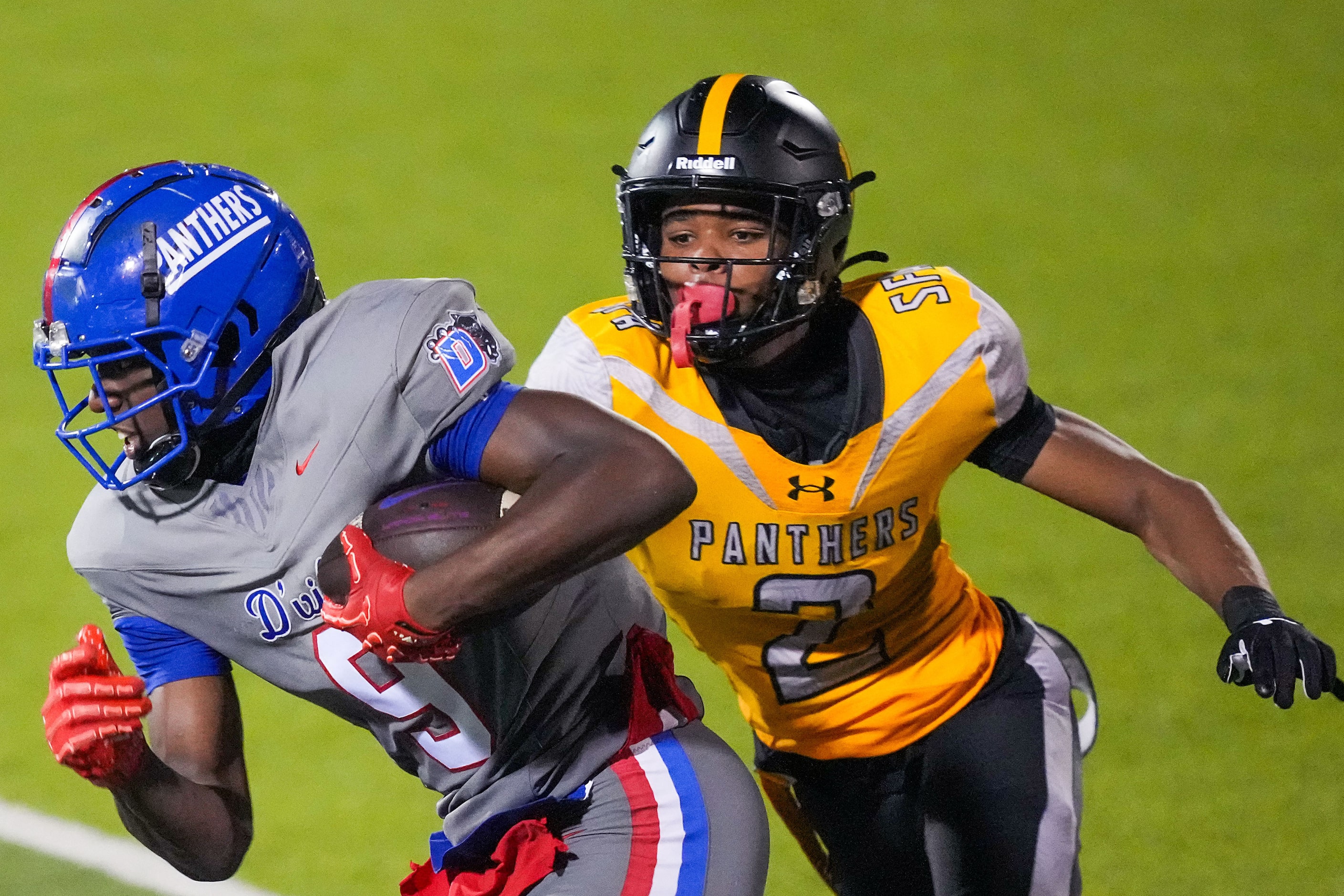 Duncanville wide receiver Zach Turner (9) gets past St. Frances Academy defensive back Byron...