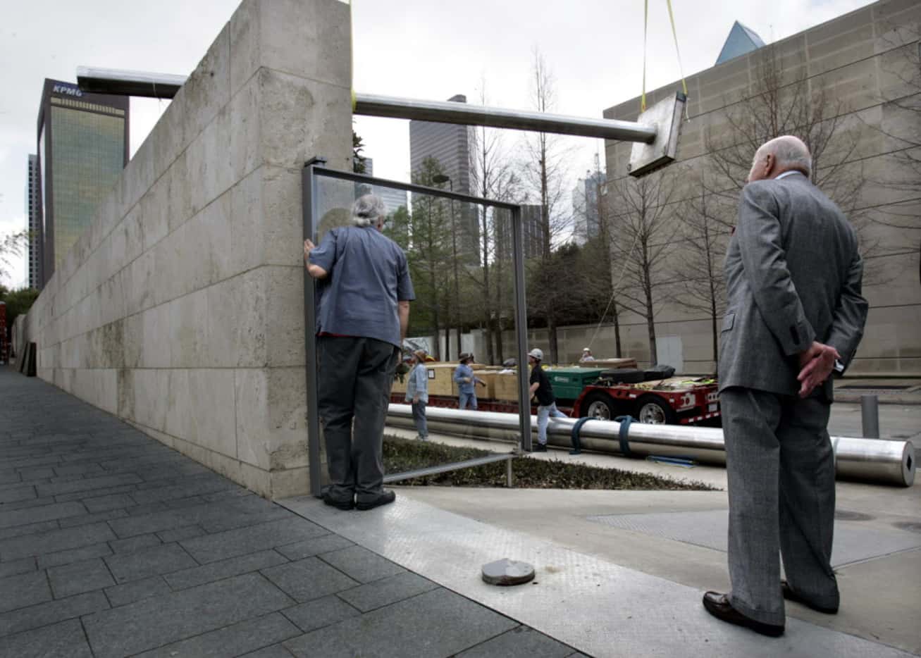 On March 21, 2005, Ray Nasher (right) and sculptor Jonathan Borofsky watched as the lower...