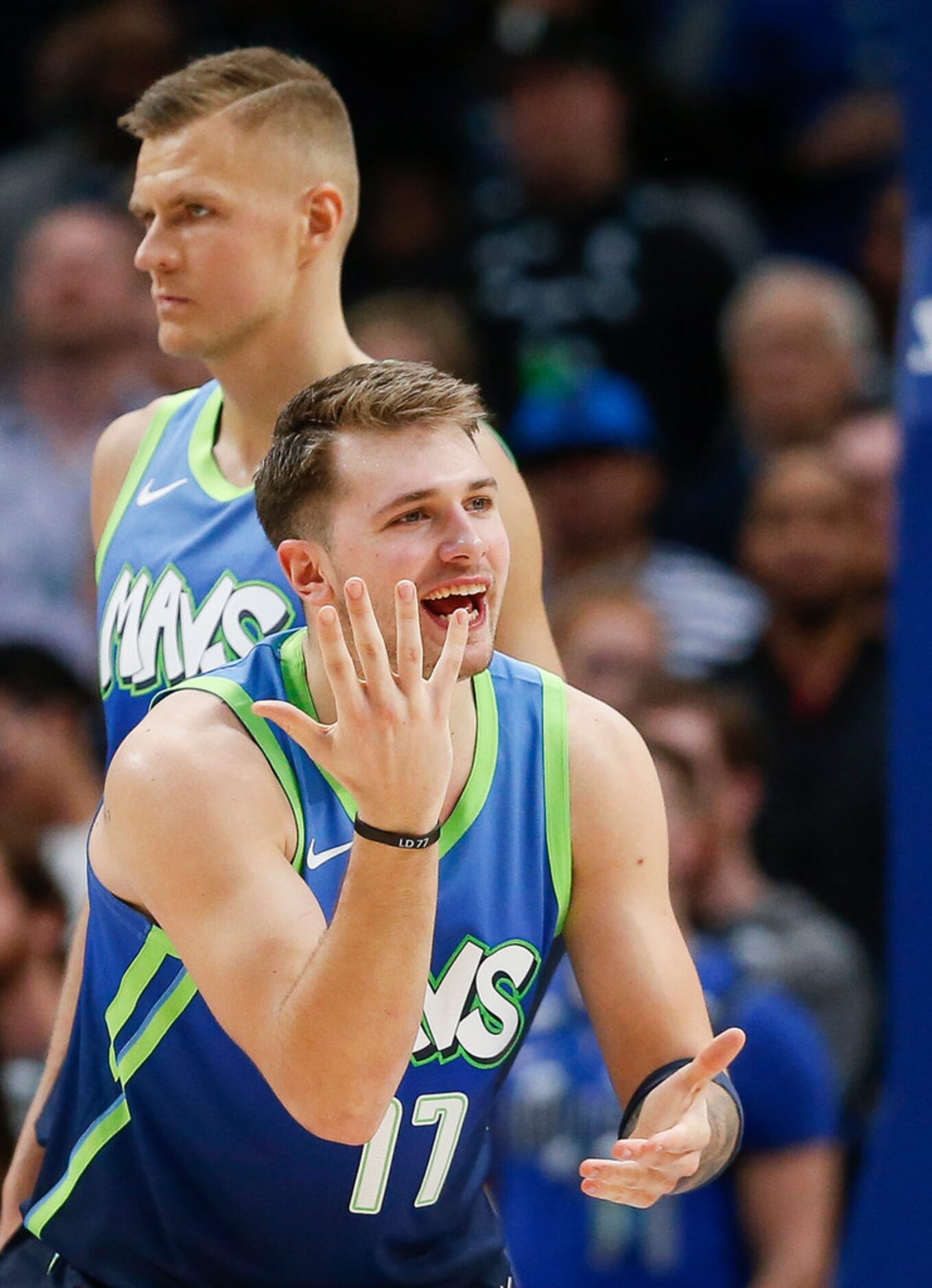 Dallas Mavericks forward Luka Doncic (77) reacts to an official's call alongside Dallas...