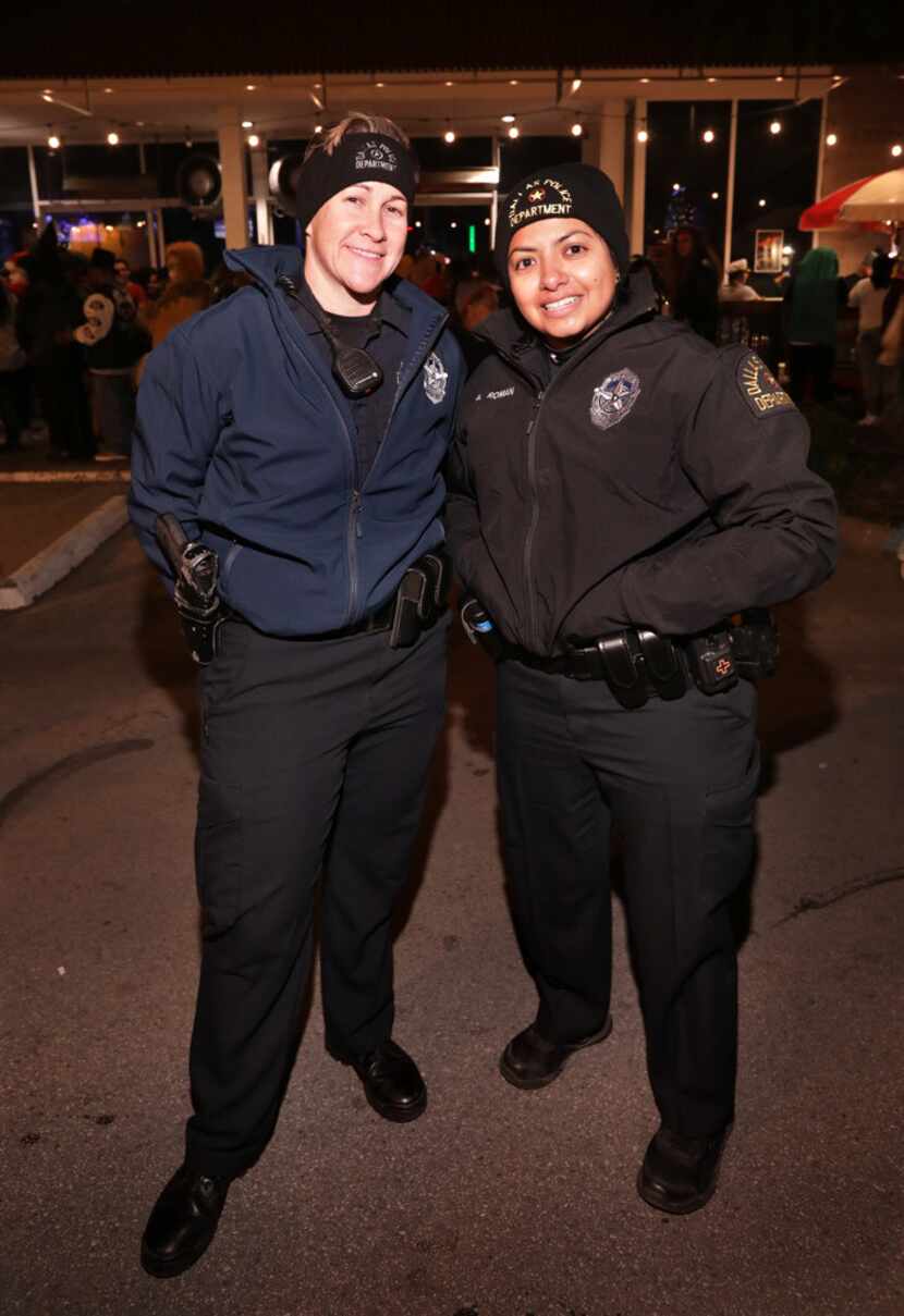The real thing: Dallas Police officers K. Schiver, left, and A. Roman keep everything...