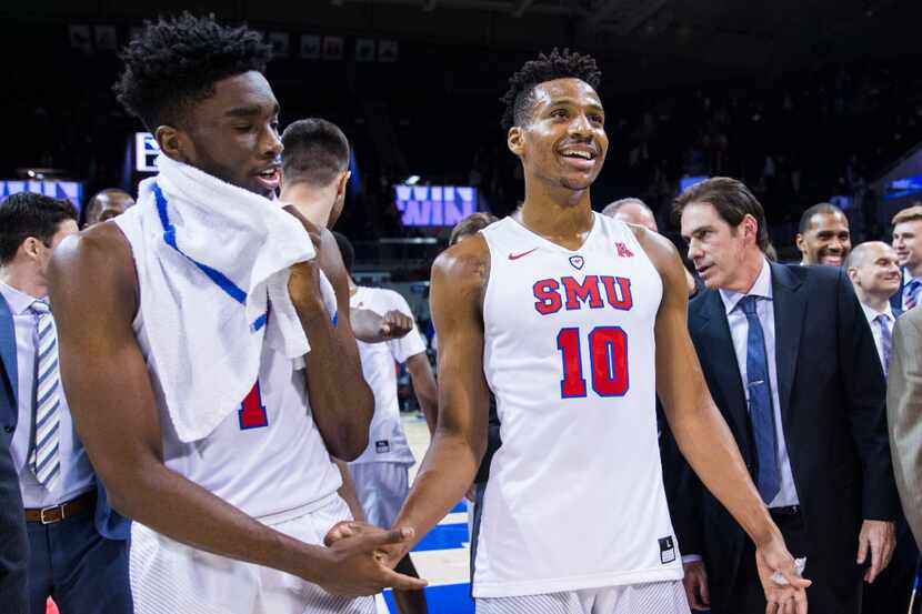 Southern Methodist Mustangs guard Shake Milton (1) and guard Jarrey Foster (10) celebrate a...