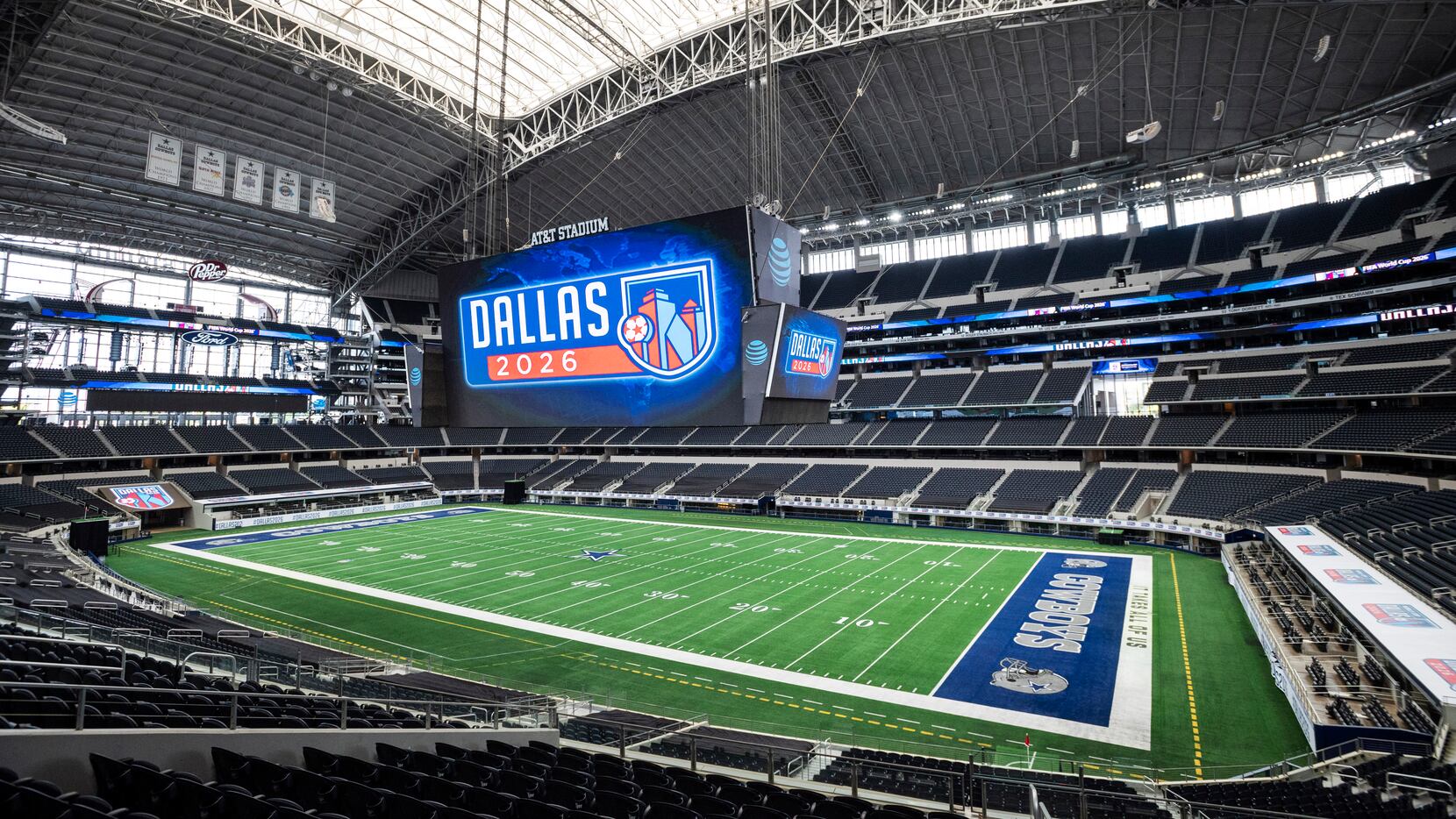 Dallas 2026 candidate host city logos are on display on the giant video board at AT&T...