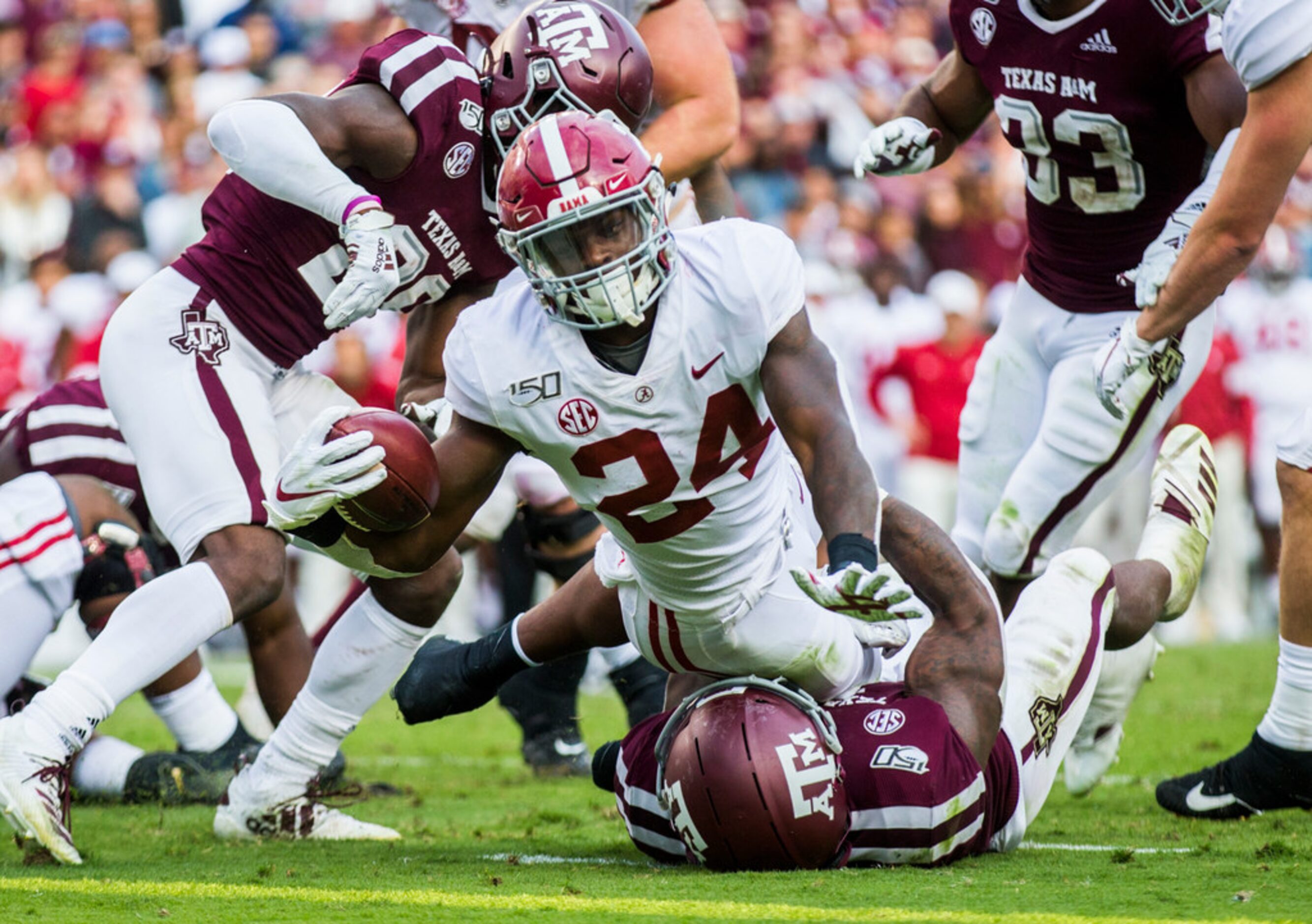 Alabama Crimson Tide running back Brian Robinson Jr. (24) stretches across the goal line for...