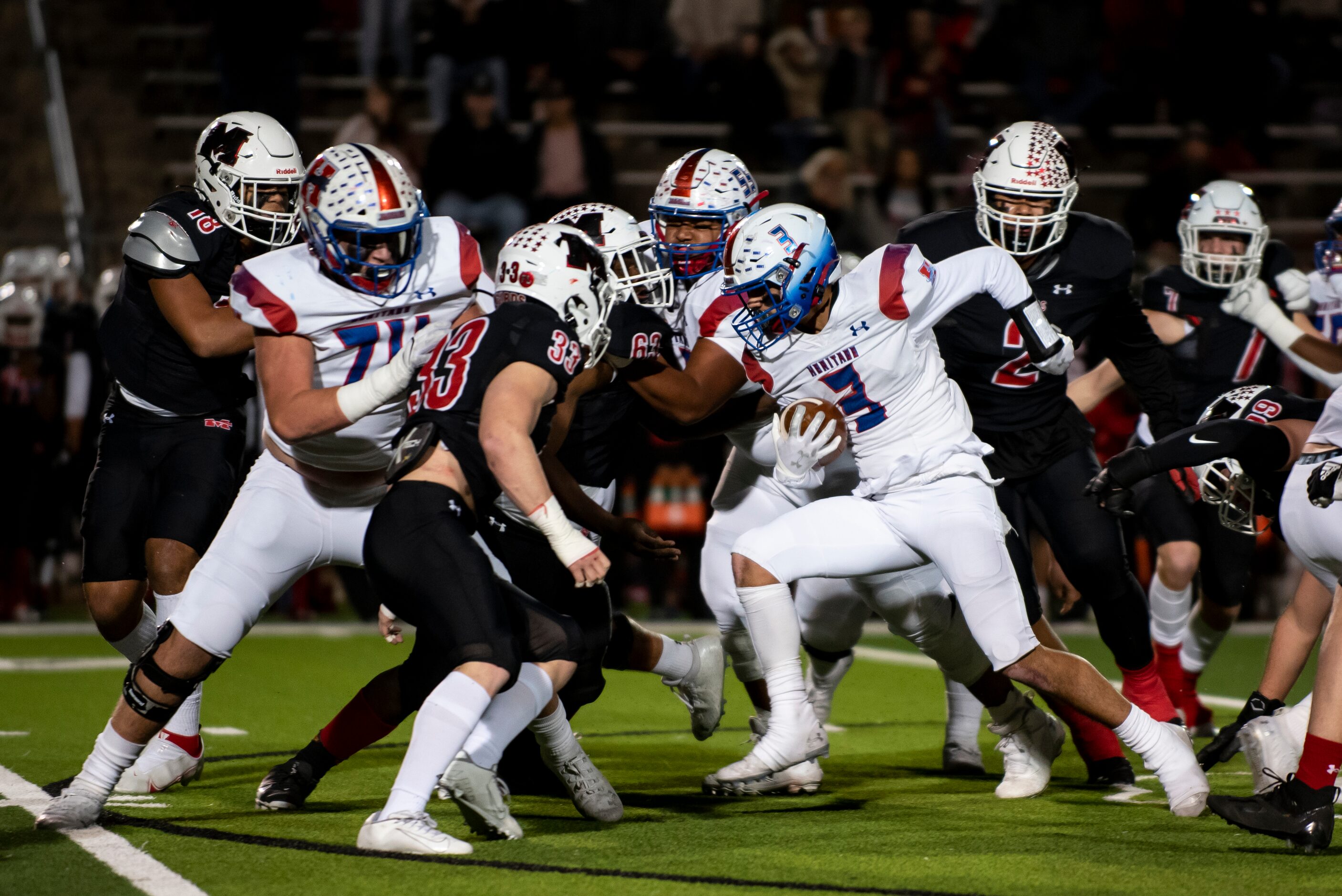 Midlothian Heritage junior Jason Barela (3) rushes up the field to gain yardage during the...