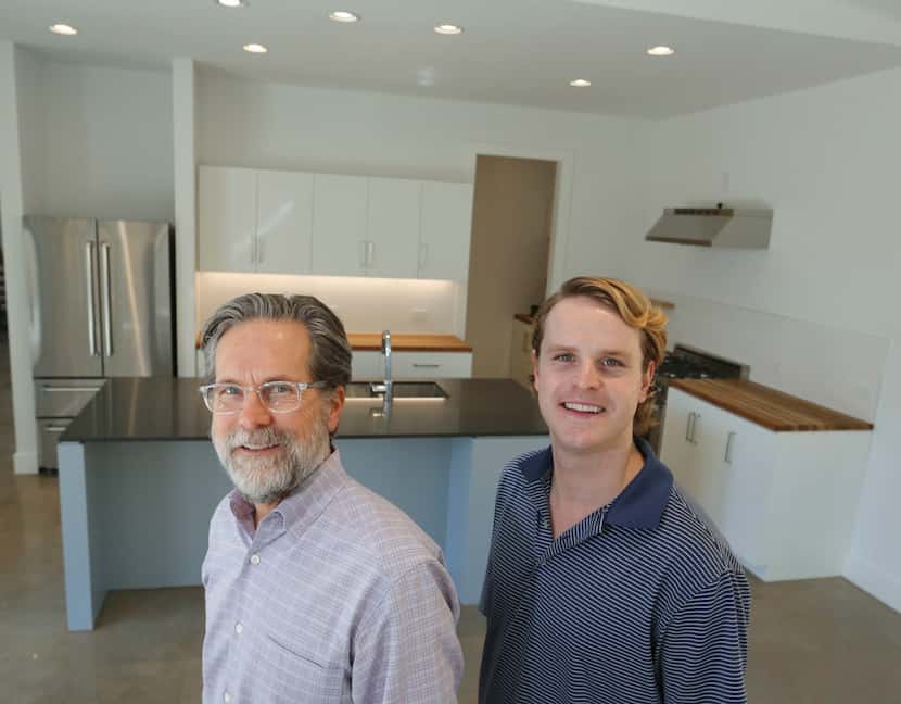 Kyle Fagin, left, and son Connor Fagin, owners of Fagin Partners, in the kitchen of the...