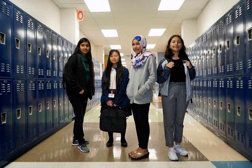 Liliana Chavez (13), Hser Eh Doh (13), Syahira Noor Bashar (13), and Briana Barron (15), at...