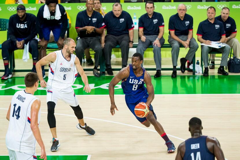 Harrison Barnes (8) of USA drives into the lane against Marko Simonovic (5) and Nikola Jokic...