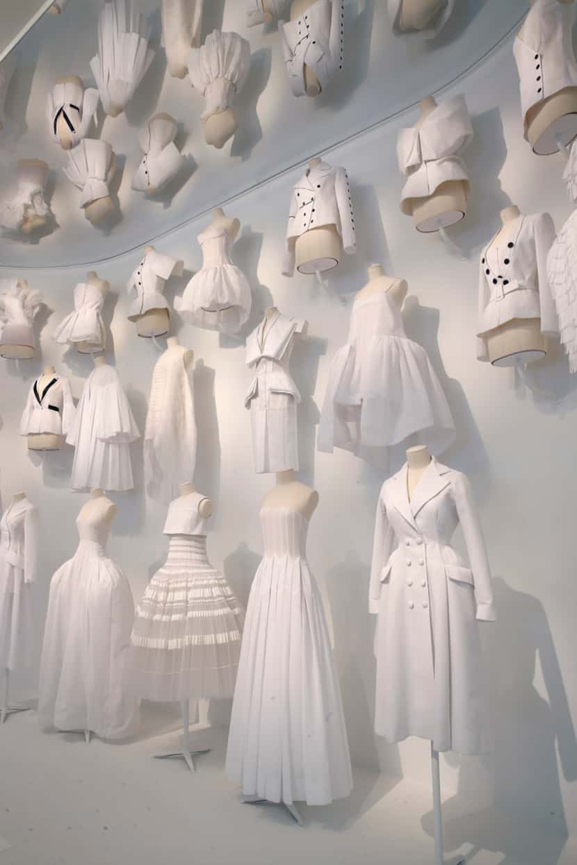 The "Office of Dreams" area of the Dior exhibition shows the white toiles that fashion...