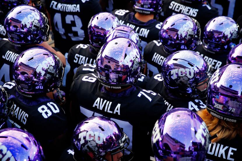 TCU players gather at Amon G. Carter Stadium in Fort Worth, Thursday, October 11, 2018. (Tom...