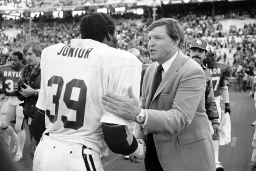 FILE - In this Jan. 1, 1981, file photo, Baylor head football coach Grant Teaff, right,...