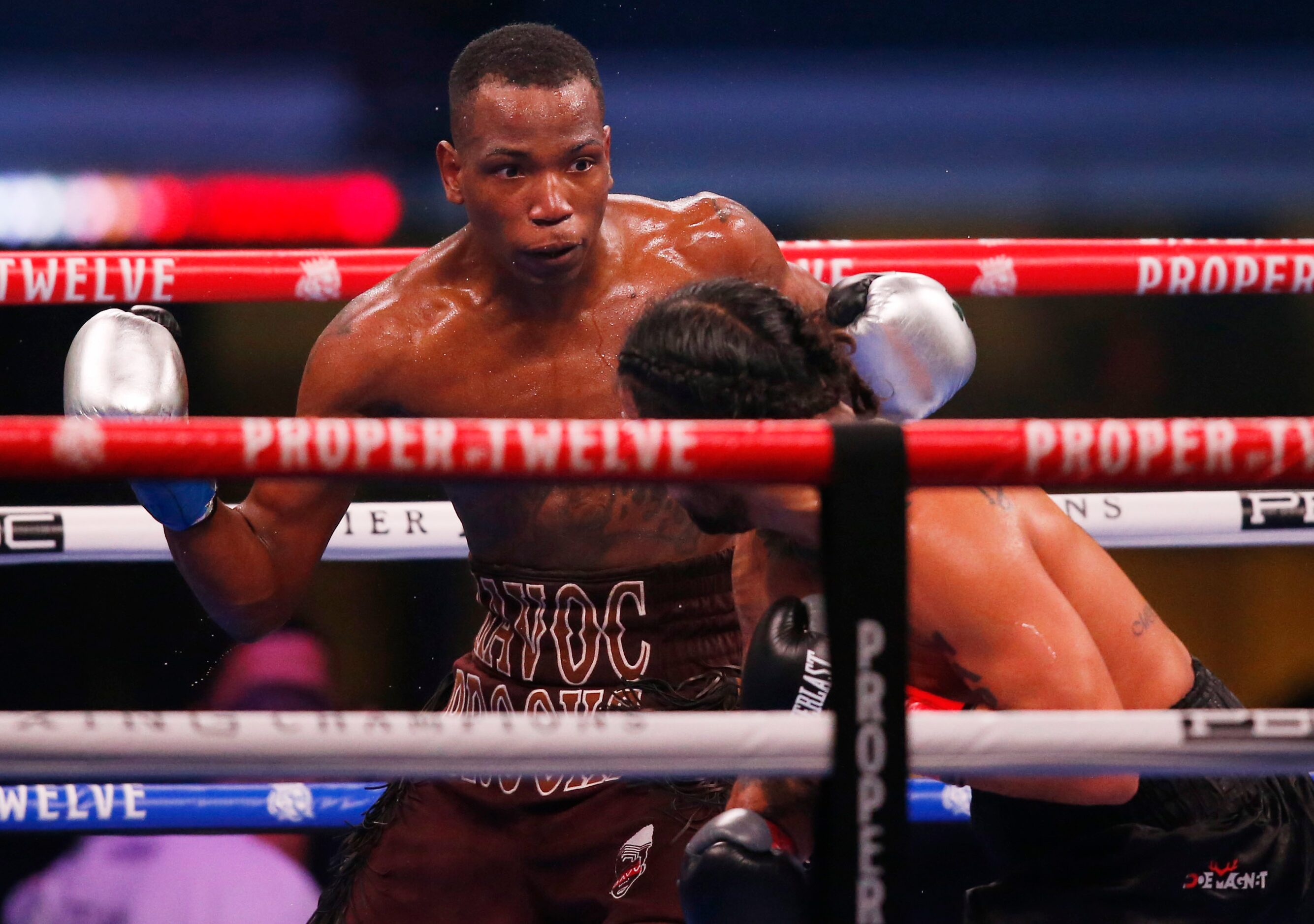 Burley Brooks fights Marco Delgado during the third round at AT&T Stadium on Saturday,...