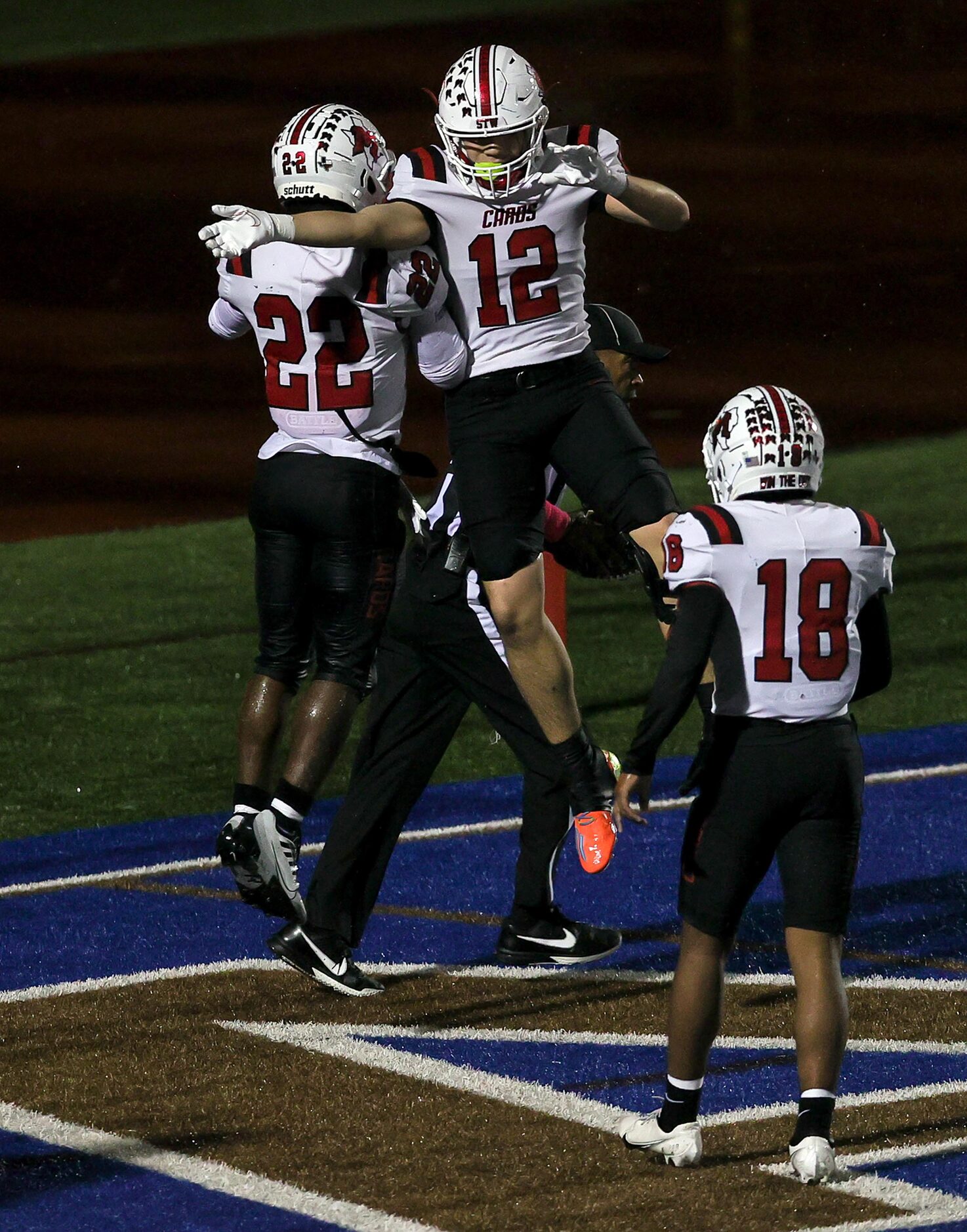 MacArthur running back Jerbrandin Henderson (22) and tight end Nathan Alvarado (12)...