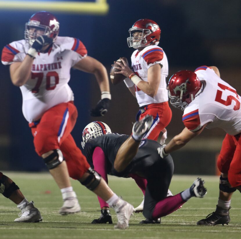 Grapevine quarterback Alan Bowman (12) calmly surveys his options downfield behind the...