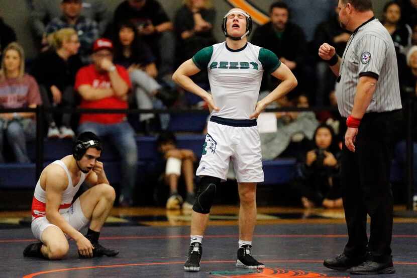 Tucker Spradley (center) of Frisco Reedy High School defeated Otto Rios (left) of Grapevine...