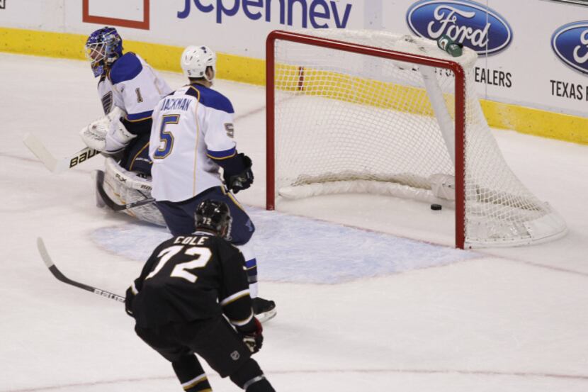 The Dallas Stars' second goal is scored by Derek Roy (not pictured) during a game versus the...