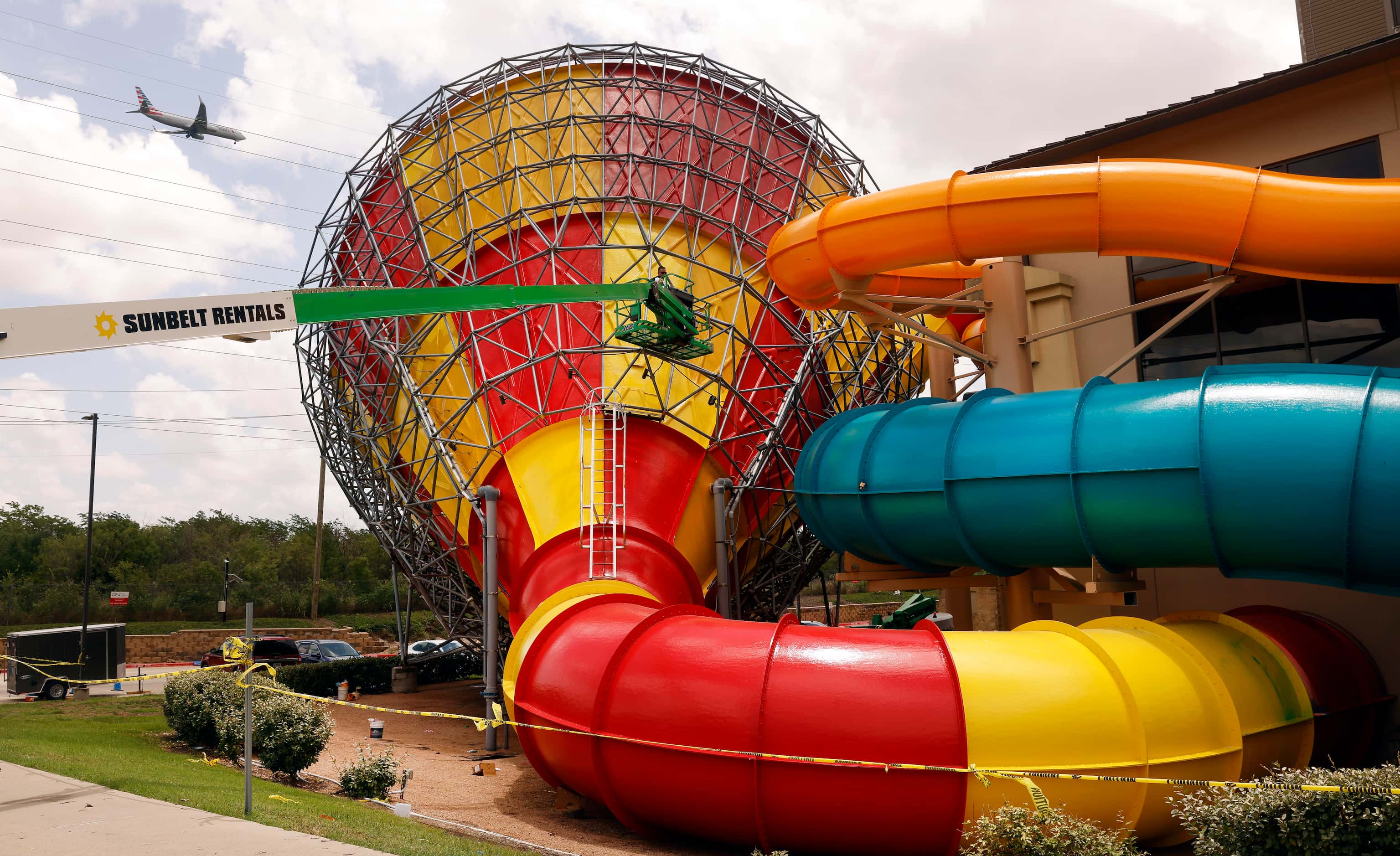 A crew works on the Howlin’ Tornado at the Great Wolf Lodge waterpark in Grapevine, Texas as...