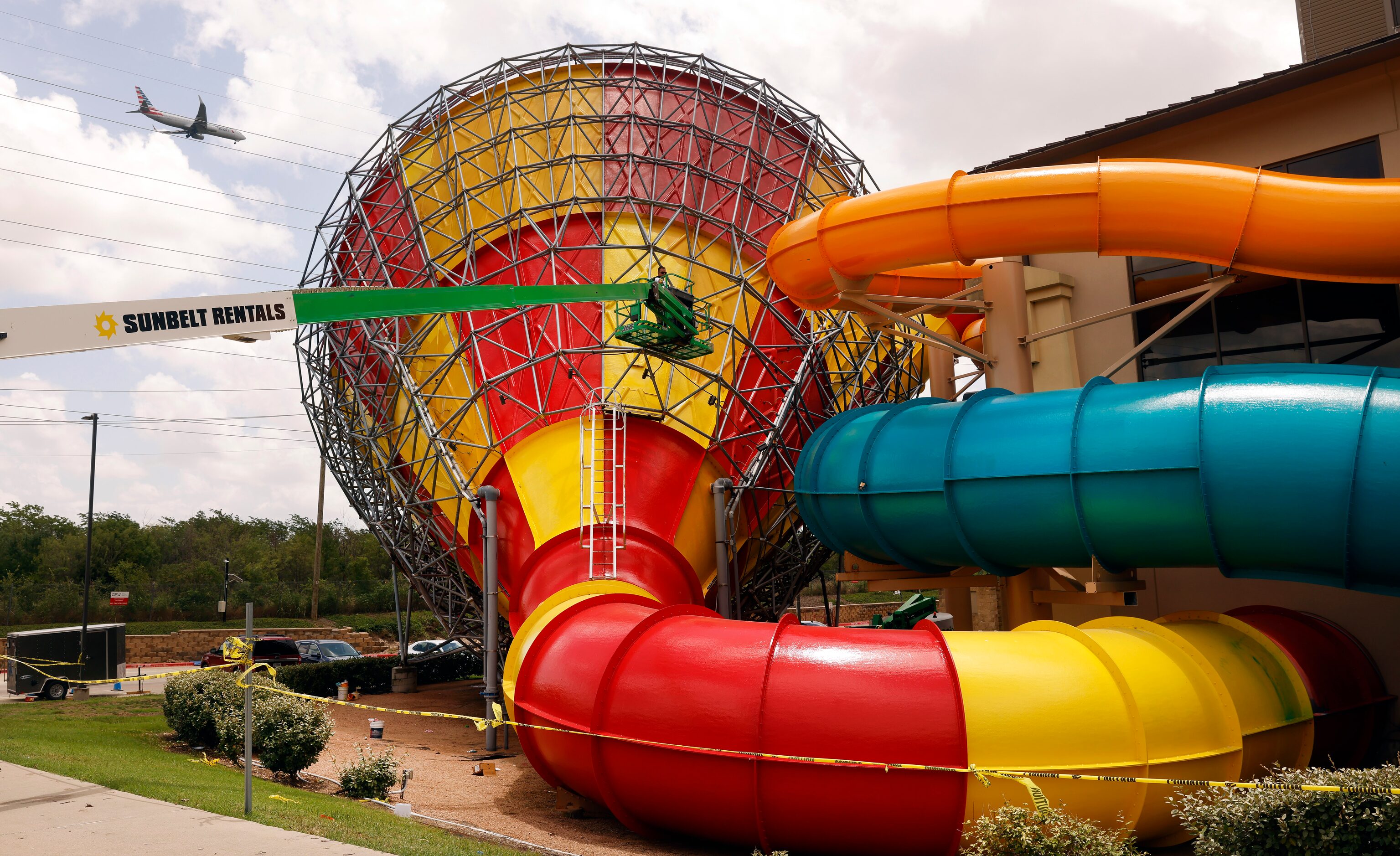 A crew works on the Howlin’ Tornado at the Great Wolf Lodge waterpark in Grapevine, Texas as...