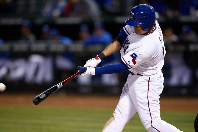 Apr 29, 2014; Arlington, TX, USA; Texas Rangers designated hitter Shin-Soo Choo (17) hits a...