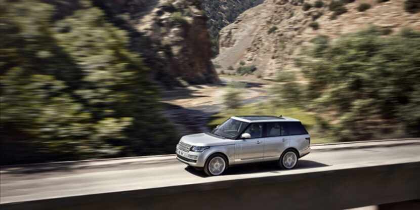 The 2013 Land Rover Range Rover HSE mostly retains its simple two-box styling: one box for...