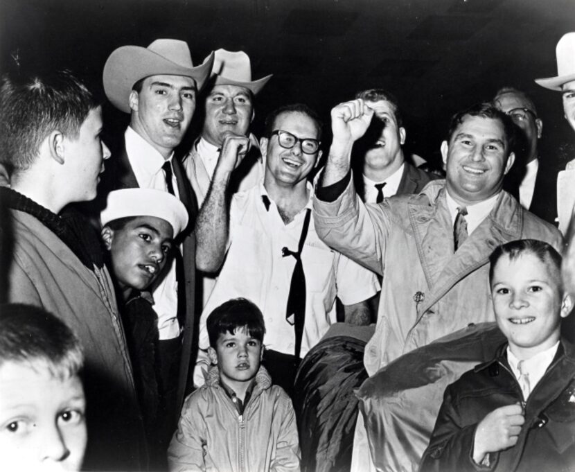 President Lamar Hunt of the Dallas Texans celebrates with his team after they defeated the...