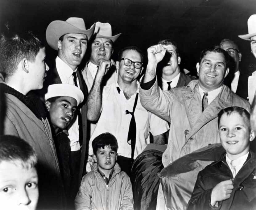 President Lamar Hunt of the Dallas Texans celebrates with his team after they defeated the...