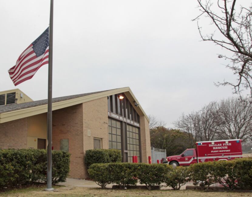 The flag flew at half-staff Tuesday outside Dallas Fire-Rescue Station 12 in honor of...