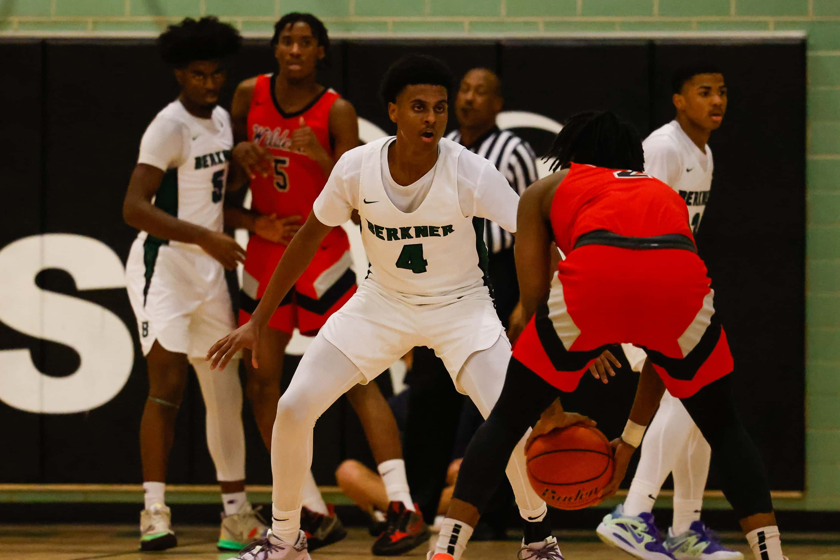 Berkner High School' Adonai Rezene #4 tries to block Lake Highlands High School' Khaleel...