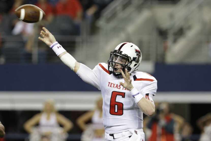 Texas Tech quarterback Baker Mayfield (6) passes during the first half of an NCAA college...