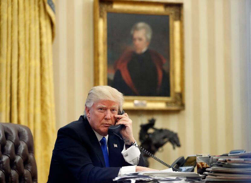 In this Saturday, Jan. 28, 2017 file photo, President Donald Trump speaks on the telephone...